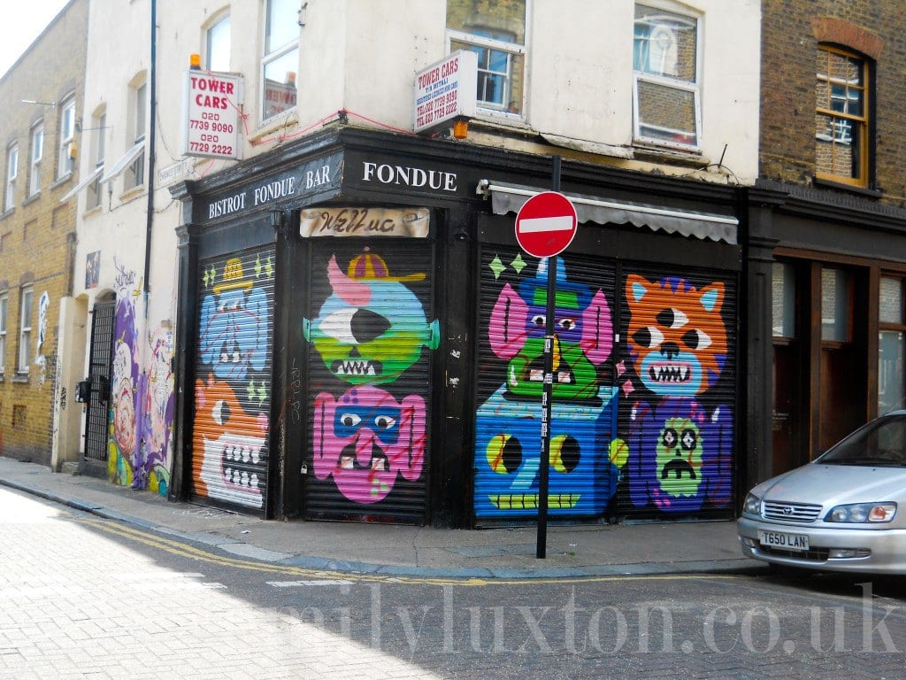 street art by Malarky on an East London walking tour 