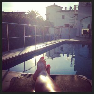 Feet by the pool