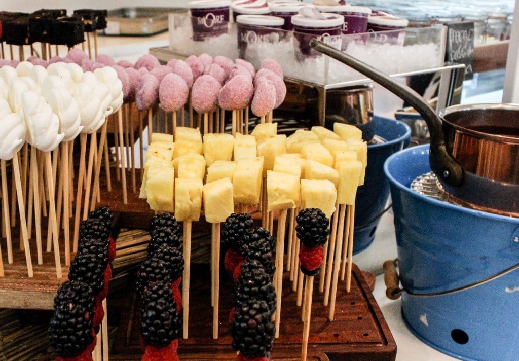 close up of an array of sticks with different pieces of fruit on at a brunch in dubai