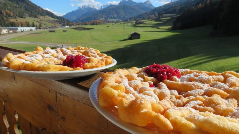 Strauben Tyrolean pancake with mountains in the background