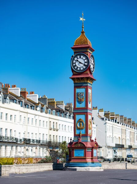 Victorian Clock tower painted red and blue on Weymoth seafont.