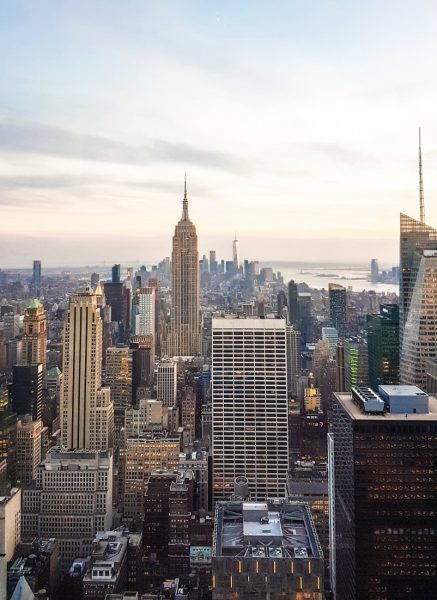 view of the new york skyline with the empire state building visible in the centre - cool things to do in nyc