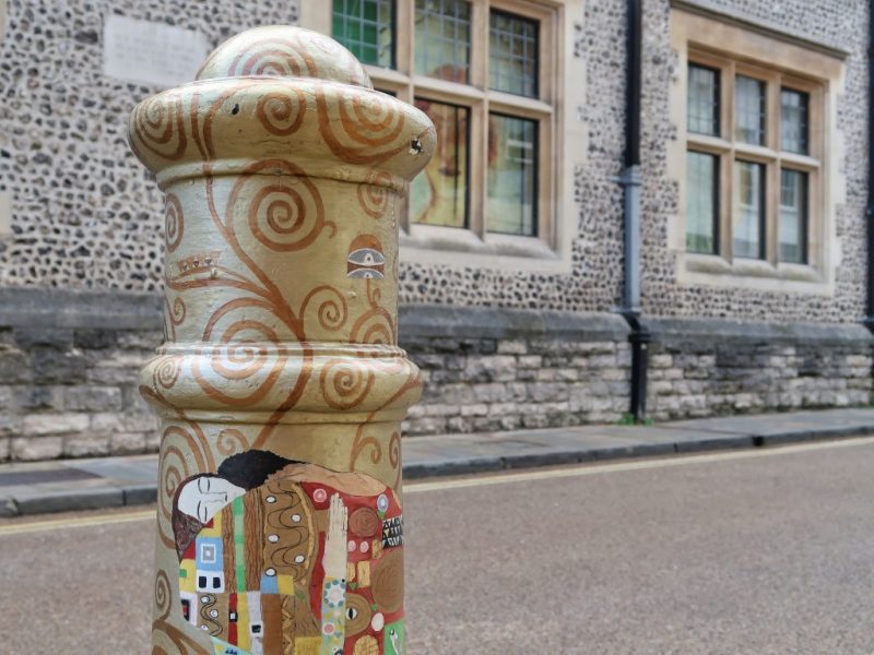 Gold Painted Bollard on City Street