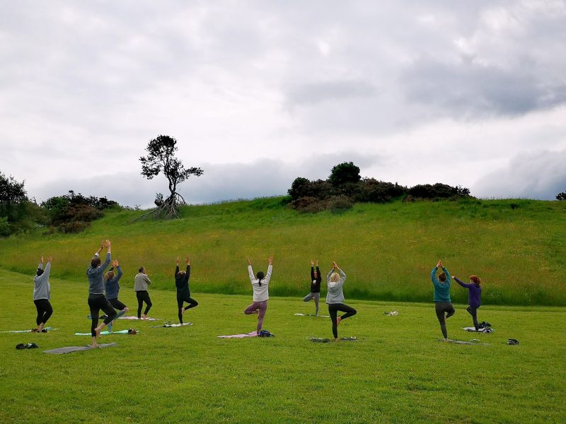 outdoor yoga session on a wellness retreat in wales uk