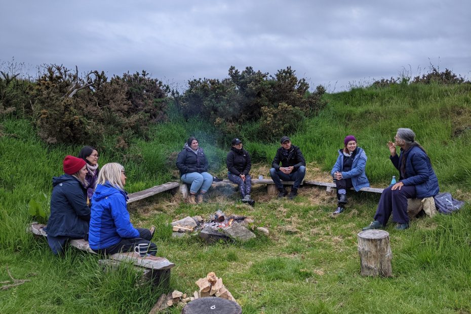 Storytelling around the campfire wild wellness retreat uk