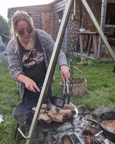 cooking outdoors on a campfire