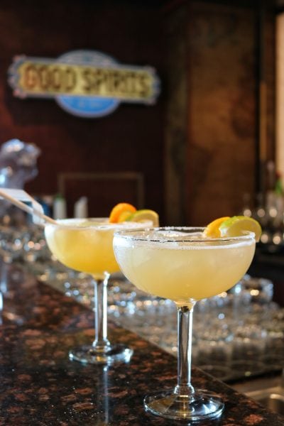 Two orange cocktails on a bar in Good Spirits on the Regal Princess cruise ship