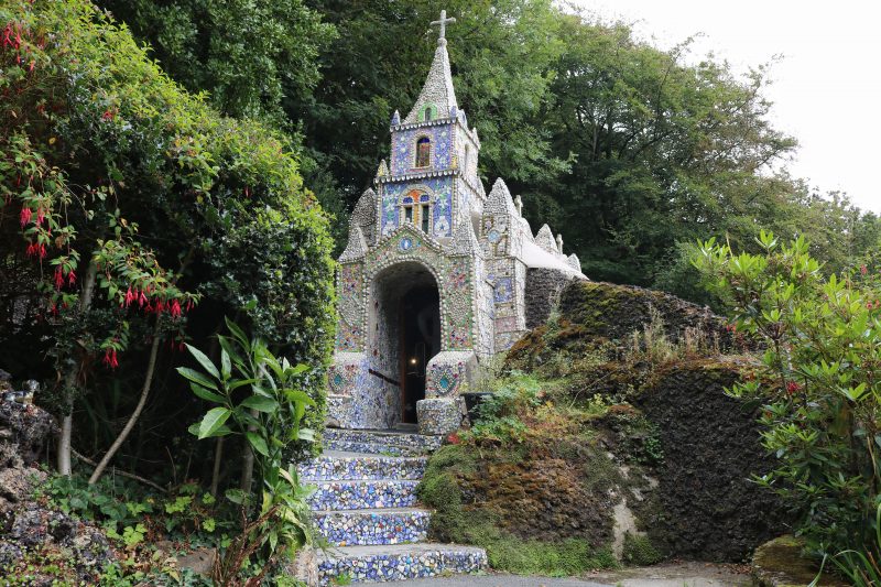 Small church covered in mosaic pieces