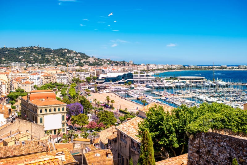 an aerial view of cannes and the marina on a sunny day
