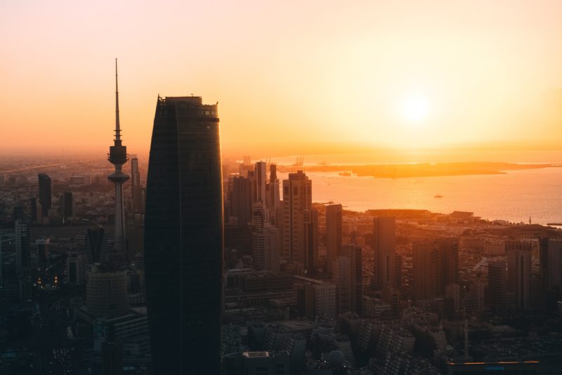 Kuwait city skyline as a silhouette at sunset