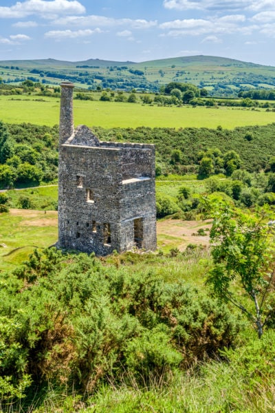 Wheal Betsy near Tavistock - a ruined tin mine surrounded by grassy fields