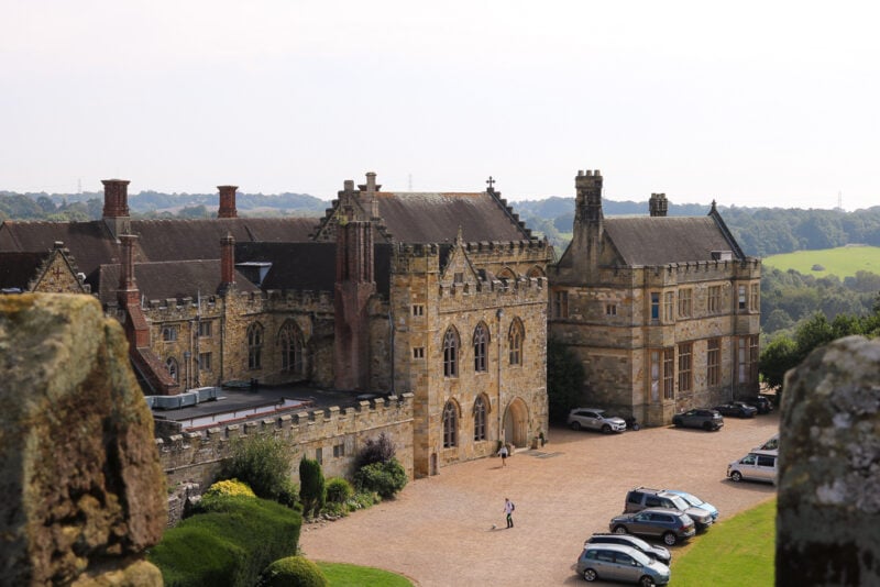 view of the large stone manor house at Battle Abbey from above