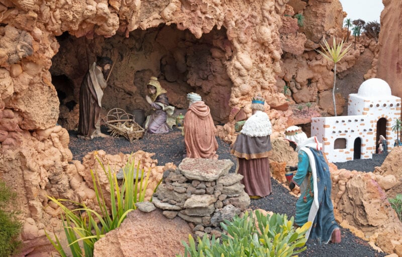 Christmas nativity scene in a stable with baby Jesus in a manger, Mary and Joseph - Three kings arriving. Belen in Lanzarote at Christmas. 