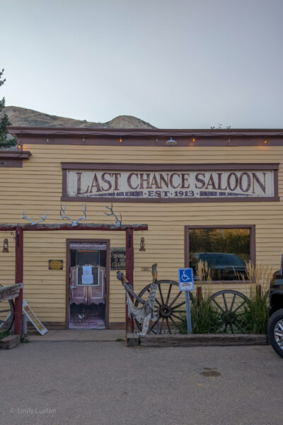 Exterior of the Last Chance Saloon in Wayne, Alberta, with yellow painted wood pannels