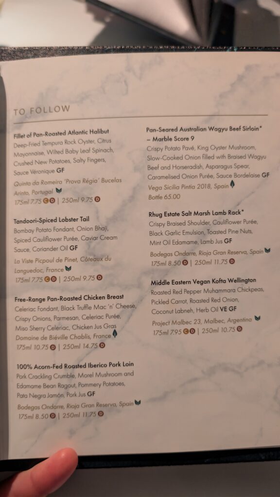 White paper menu with black writing