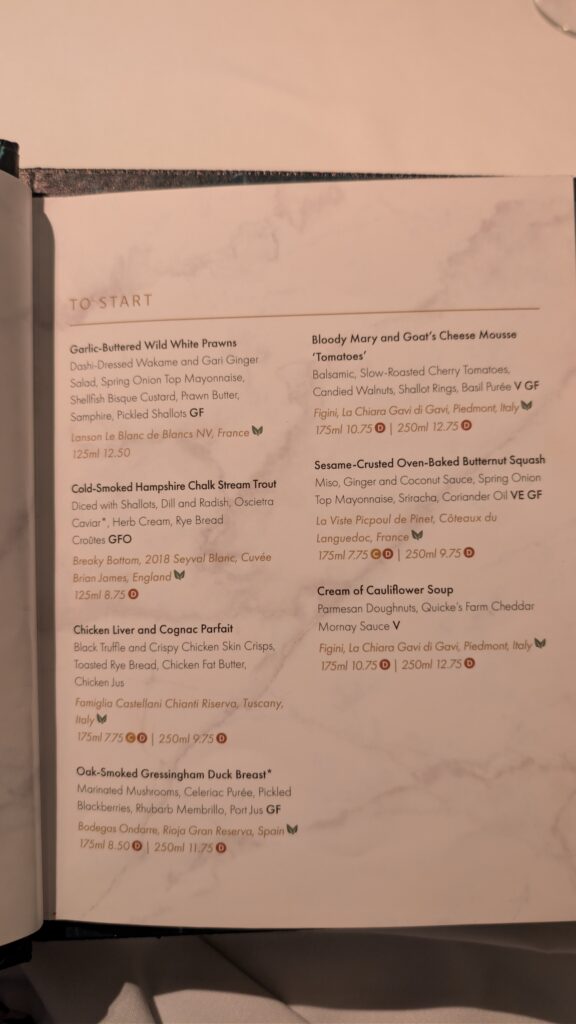 White paper menu with black writing