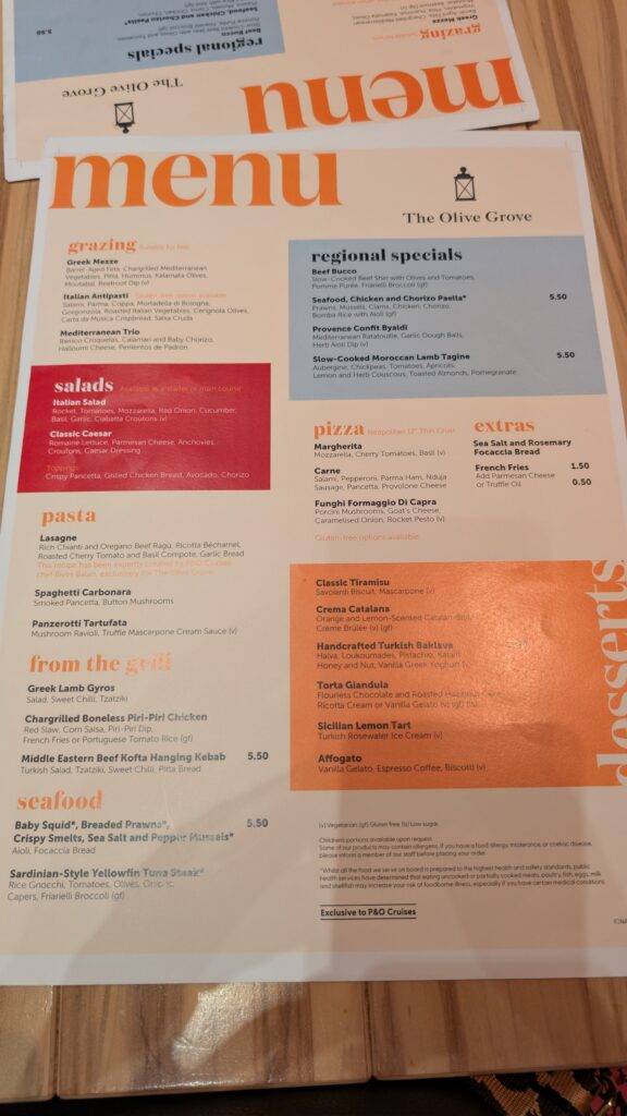 Large paper menu with orange, red and blue colour sheme